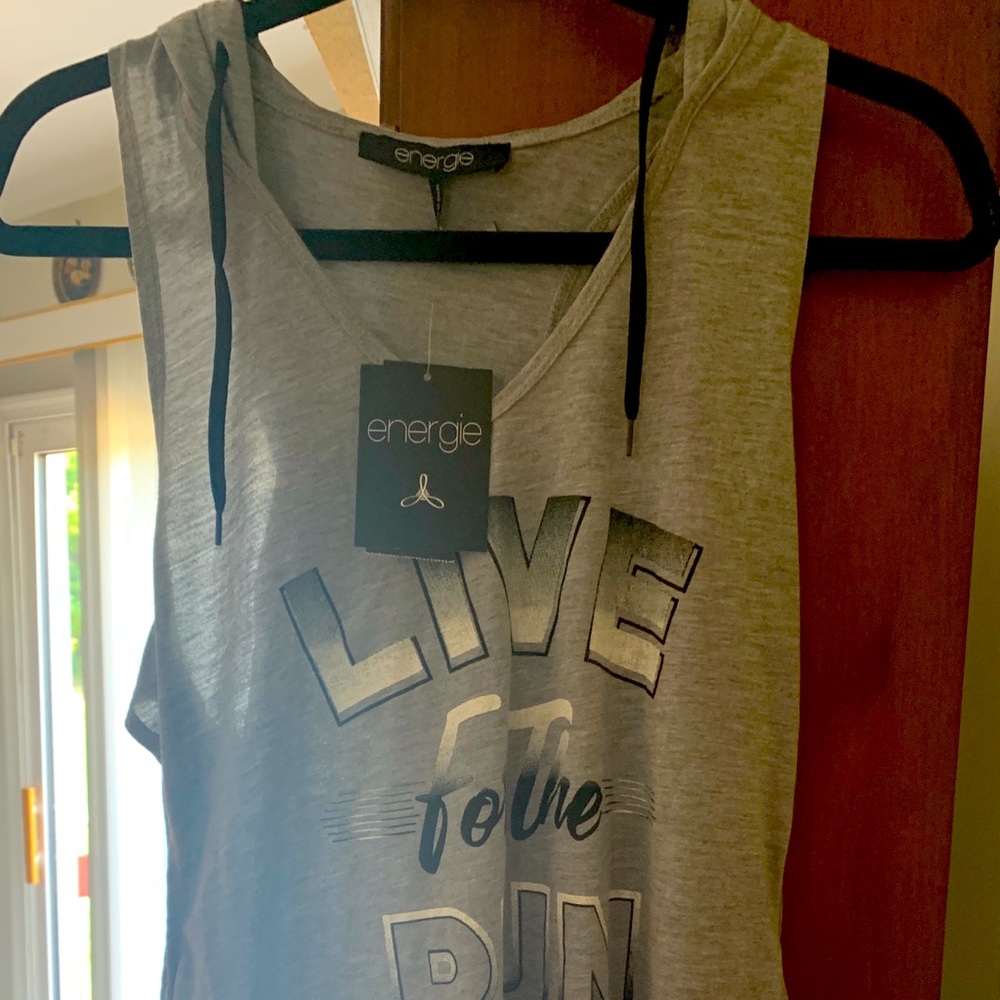 Jogging, running , exercise or beach shirt!! Lightweight and stylish size large.